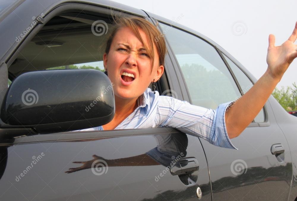 angry-woman-yelling-out-car-window-212012.jpg